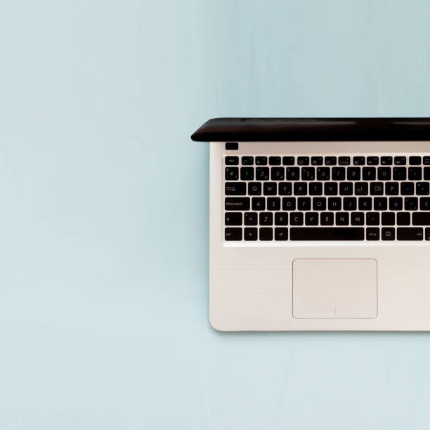 istock Squared flat lay of laptop with copy space for design or text 1447004176