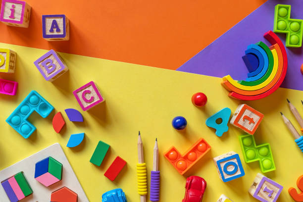 istock Wooden toys, blocks with abc, with numbers. Preschool, elementary school education. Development games for kids. Educational daycare toys. 1447005689