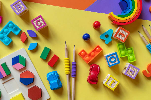 istock Wooden toys, blocks with abc, with numbers. Preschool, elementary school education. Development games for kids. Educational daycare toys. 1447005718