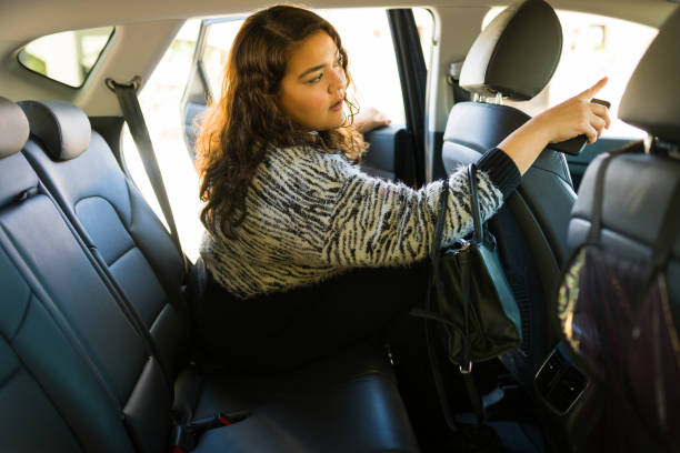 istock Obese woman on a rideshare car service 1447008832