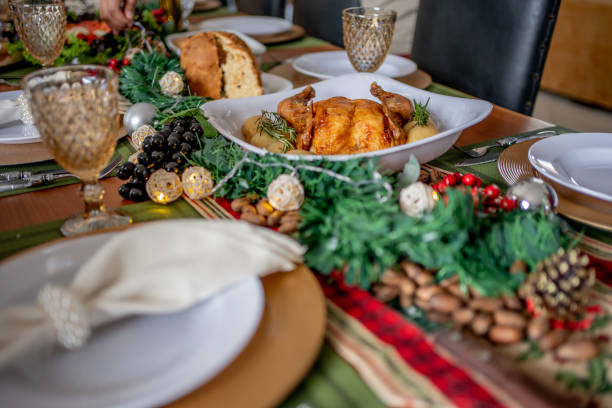Mature couple preparing Christmas table