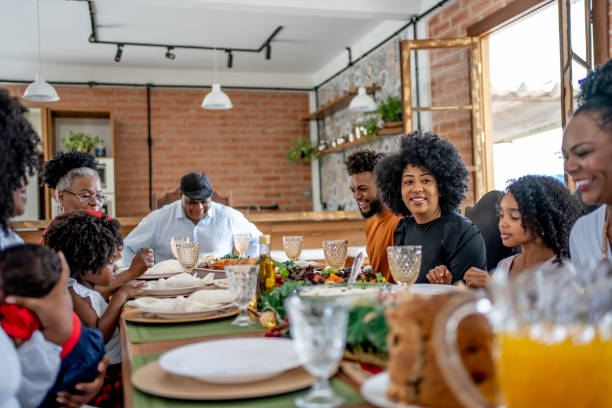 istock Family together for Christmas lunch 1447010345