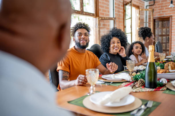 istock Family together for Christmas lunch 1447010408