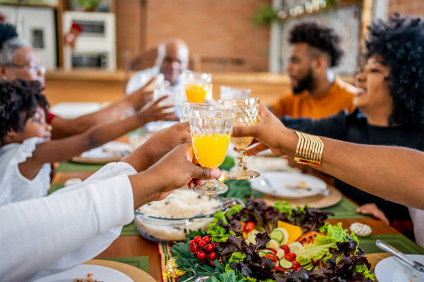 istock Family toasting Christmas dinner at home 1447011450
