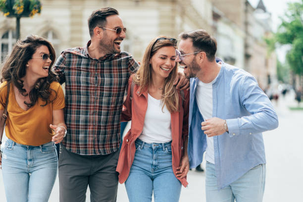 istock Friends having fun outdoors in the city 1447012648
