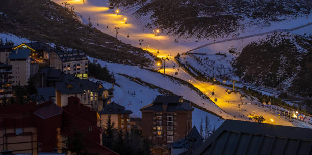 istock Mountain skiing at night - Pradollano, Sierra Nevada, Spain 1447015538