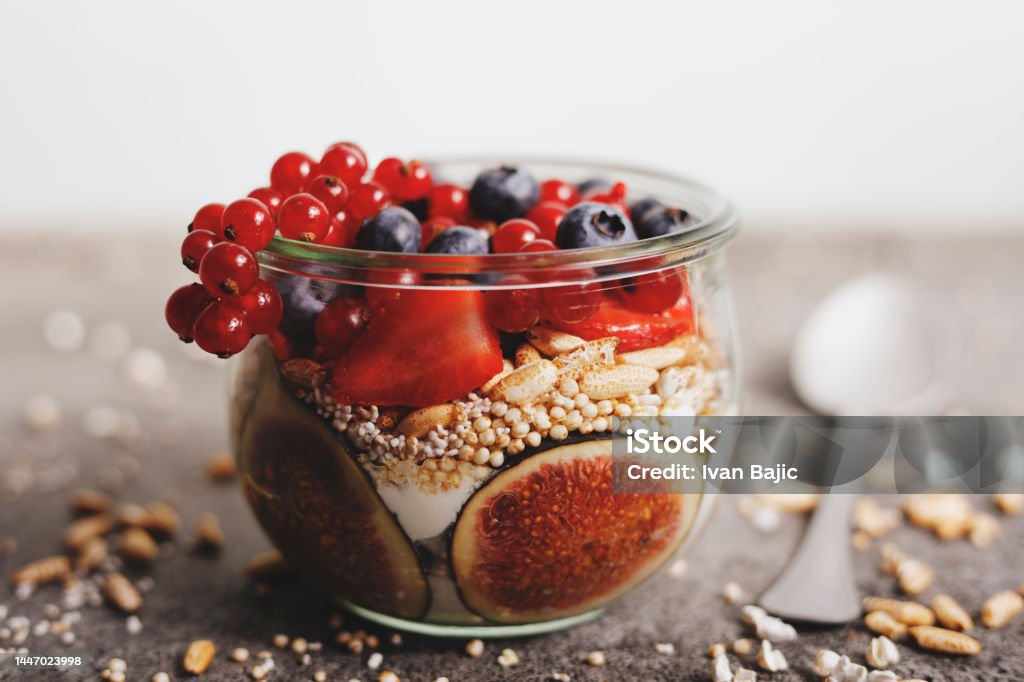 Healthy breakfast Healthy breakfast with fruit, puffed rice and quinoa Gluten Free Stock Photo