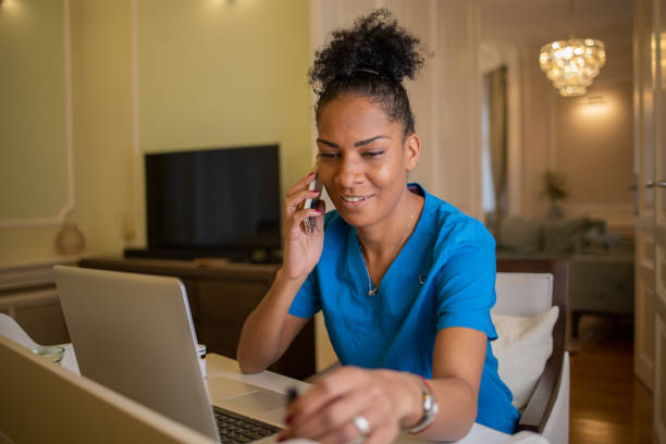 istock Female doctor making video call 1447030442