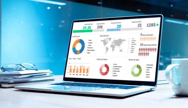 istock Presentation on display laptop with notebook and glasses on table in meeting room 1447033251