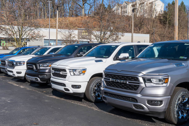 A dealership in Ross Township, Pennsylvania, USA with new RAM trucks lined up for sale stock photo