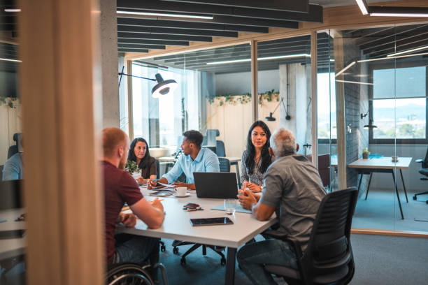 istock Small Group of People Working Together at the Office 1447036201