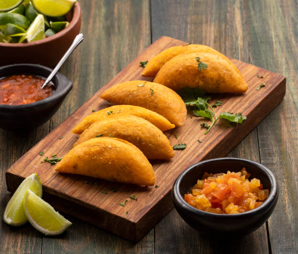 istock Fried empanadas with spicy sauce - typical Colombian food 1447041156