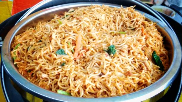istock Fried noodles with vegetables are served in a buffet bowl 1447047448