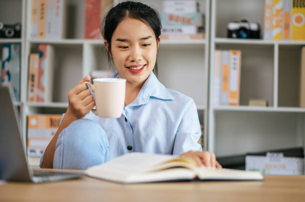 istock Young woman working at home with laptop computer 1447048910