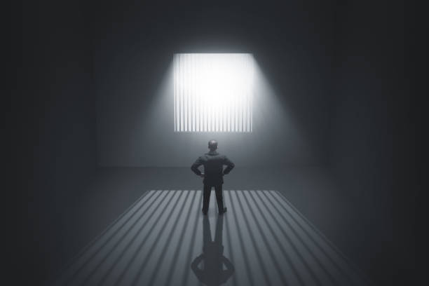 istock Business man standing in prison 3d illustration 1447053427