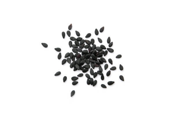 istock Group black sesame seeds  isolated on white background. 1447060927