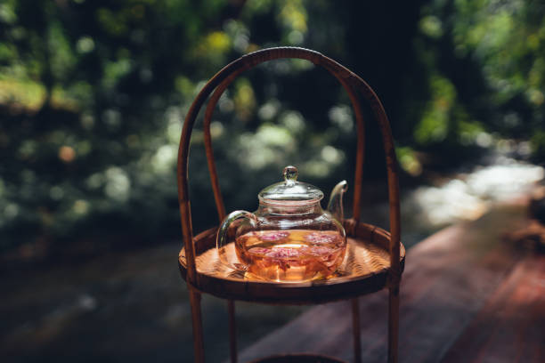 istock flower tea,Tea set on the terrace, natural background 1447062362