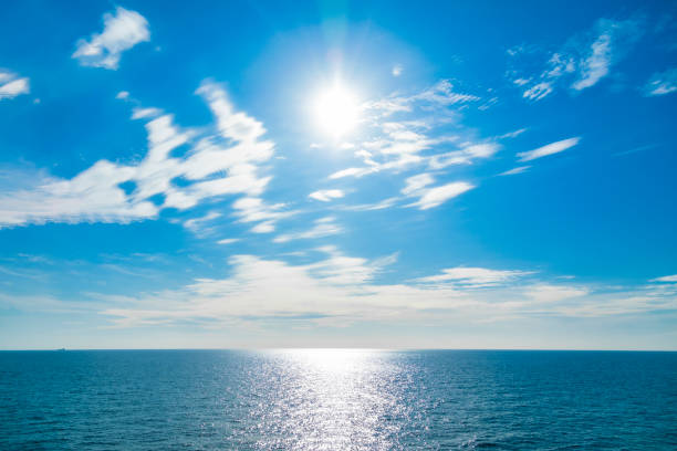 istock Blue sky, white clouds and sea 1447065172