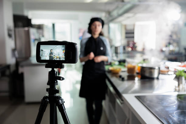 istock Confident cook shooting a culinary vlog for online platform and television program. 1447066129