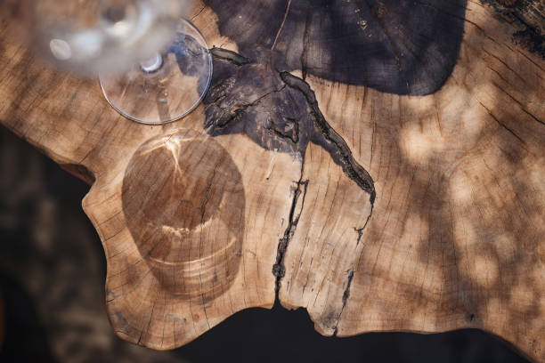 istock Reflection of wine glass on a wood. 1447069864