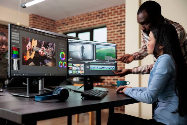 istock Creative agency video graphic editor expert enhancing footage using visual timeline and advanced software. 1447070509