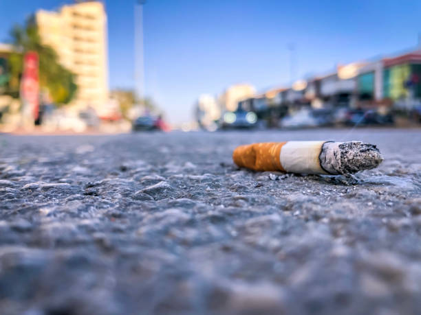 Smoking harms the environment stock photo