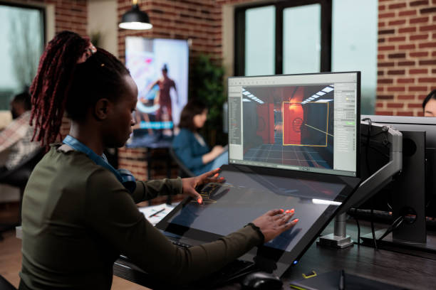 istock Game designer sitting in office workspace while working on environment and level details. 1447070685