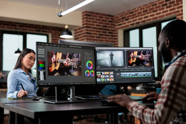istock Creative agency professional employee editing movie footage using specialized software 1447071505