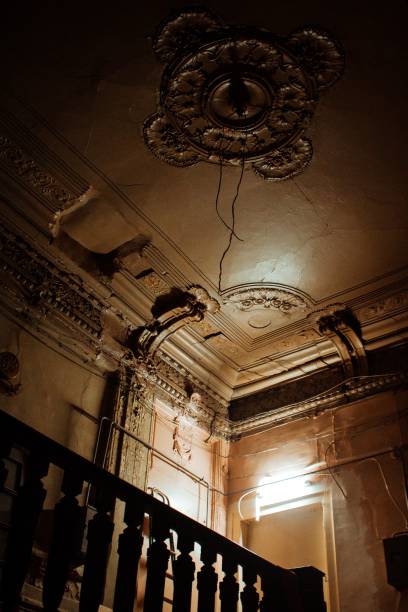 istock Vertical low-angle shot of a beautiful ceiling inside an old building. 1447071816