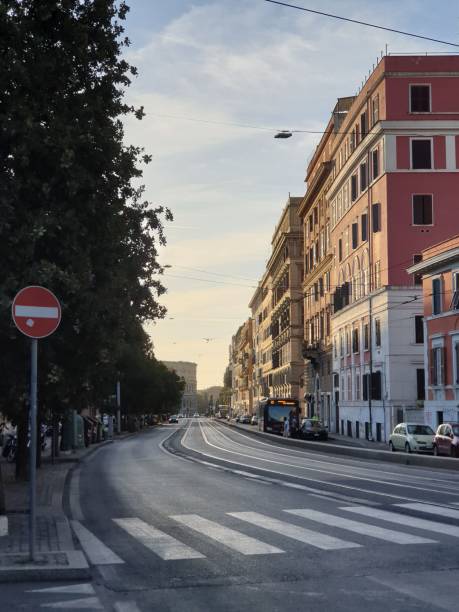 istock Road with a crossing lines in Rome 1447071986