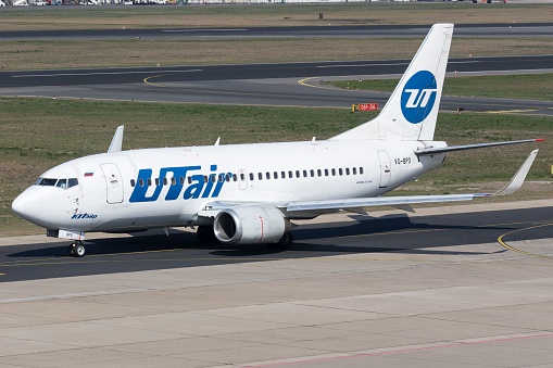 Berlin, Germany – April 09, 2019: A closeup shot of Boeing 737-500 (B735) of UTair Airlines taxing at Berlin Tegel Airport