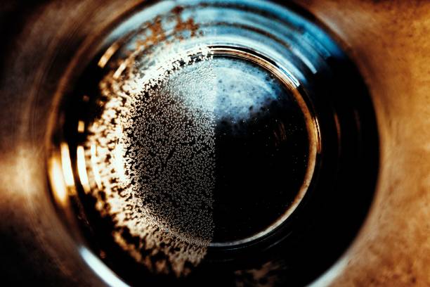 Abstract backdrop with small water bubbles on the bottom of a glass.