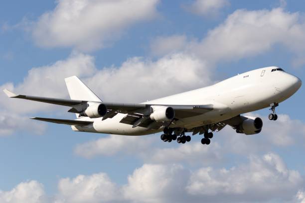 istock Boeing 747 cargo freighter plane landing at Miami Airport 1447073680