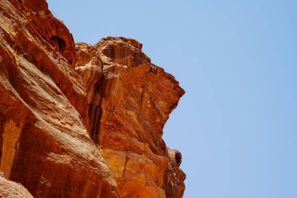istock Sandstone rock formations at Wadi Rum valley in Jordan against a blue sky 1447074694