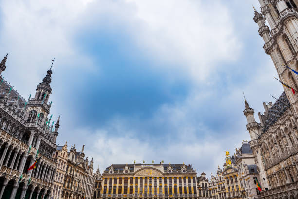 Wide angle view of the Grand Place in Brussels, Belgium with the Brussels Town Hall, Maison du Roi, and the House of the Dukes of Brabant