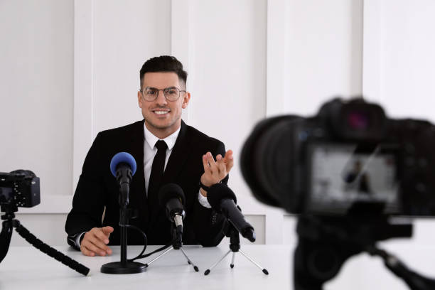 istock Business man giving interview at official event 1447075725
