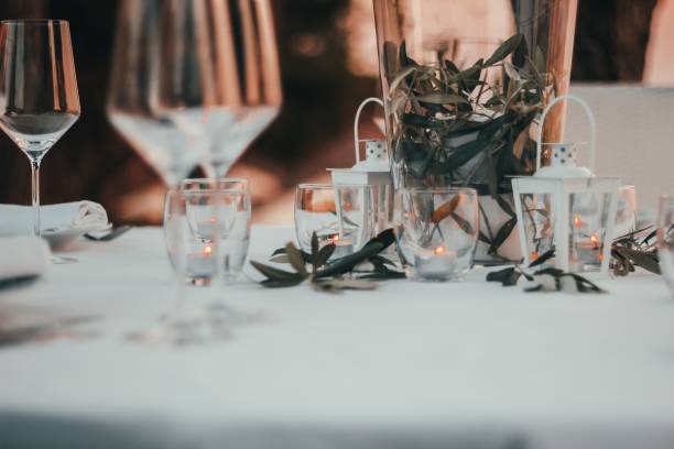 istock Beautiful view of a dinner table setting with candles 1447076335