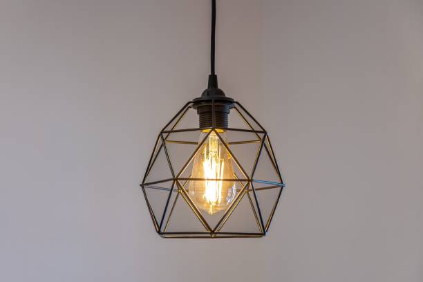 istock Black pendant lamp shade hanging on ceiling 1447076502