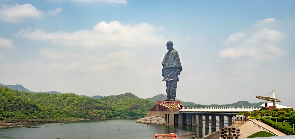 Vadodara, India – July 10, 2022: A panoramic shot of the Statue of Unity under a blue sky at daytime in Gujarat, India