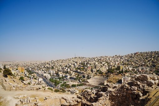 An aerial shot of the city covered with residential and office buildings, AMMAN JORDAN