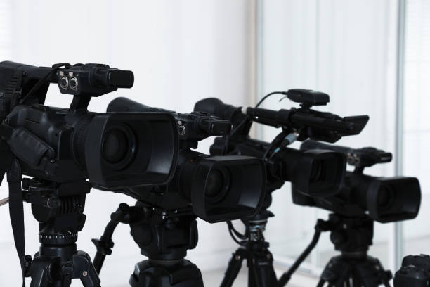 istock Modern video cameras indoors. Professional media equipment for broadcasting event 1447077863