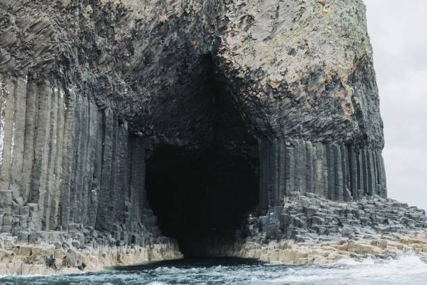 istock Fingal Cave surrounded by rocks and water 1447079449