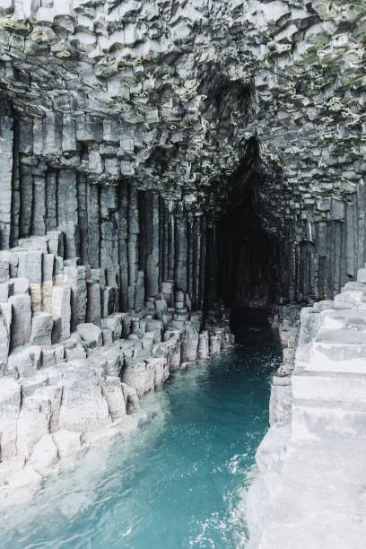 istock Fingal Cave surrounded by rocks and water 1447079457