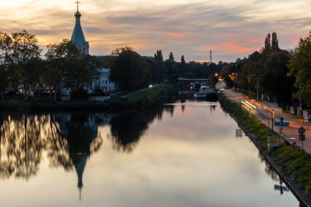 istock Russian Orthodox Church in Strasbourg reflected on a river during the sunset 1447081667