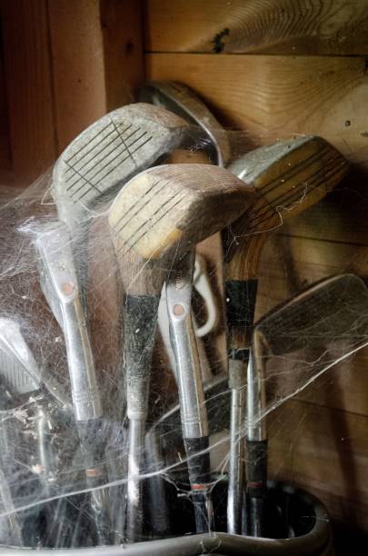 A set of new golf clubs on a white background with copy space