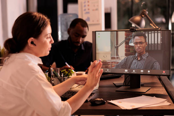istock Colleagues having conversation on corporate online meeting on computer 1447084668