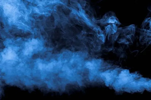 Photo of Mysterious smoke overlay on the black background