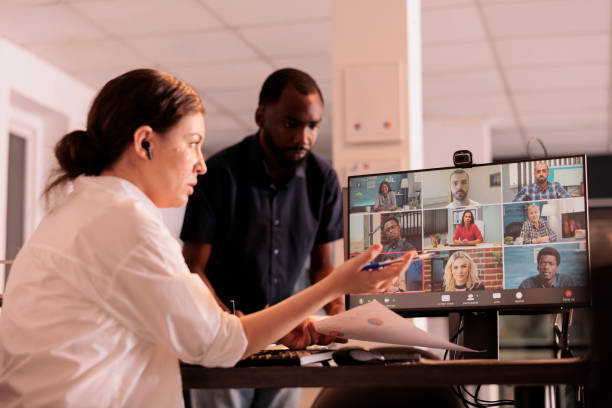 istock Project manager talking with company remote team on videocall 1447086136
