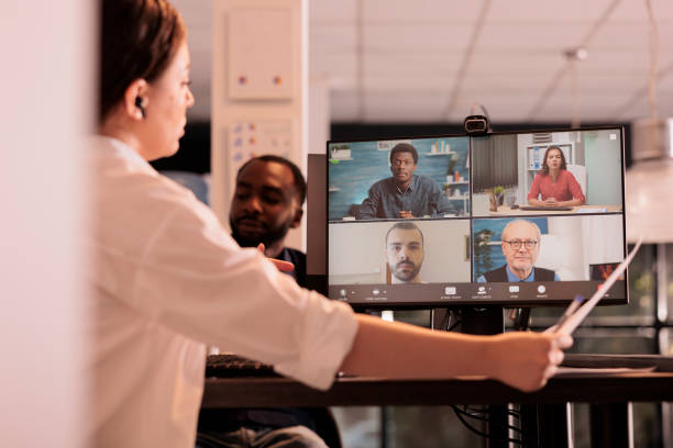 istock Corporate team online briefing, report presentation discussion on videocall 1447086515