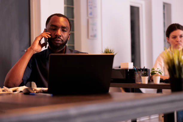 istock Project manager discussing business plan on smartphone 1447086814
